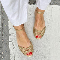 Isadora | Sandalias doradas trenzadas