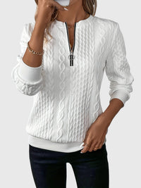 Nora – Blusa con cremallera