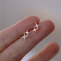 Estela | Pendientes en forma de estrella de diseño delicado