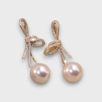 Celia | Pendientes con lazo dorado y perlas brillantes