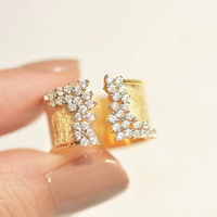 Anillo vintage abierto dorado con diamantes